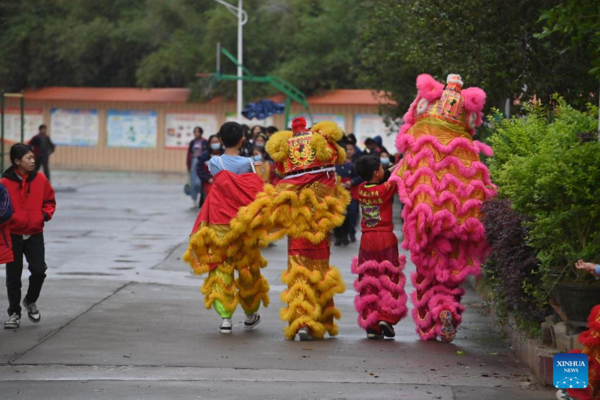 Lion Dance Integrated with School Education in Tengxian, S China