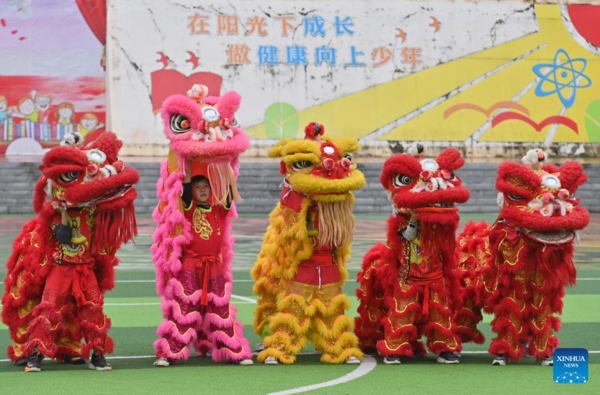 Lion Dance Integrated with School Education in Tengxian, S China