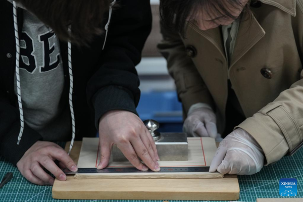 Avid Reader Restores Ancient Books in Shenyang, NE China