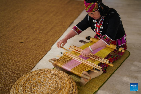 Across China: Ancient Hainanese Brocade Shines in Italy