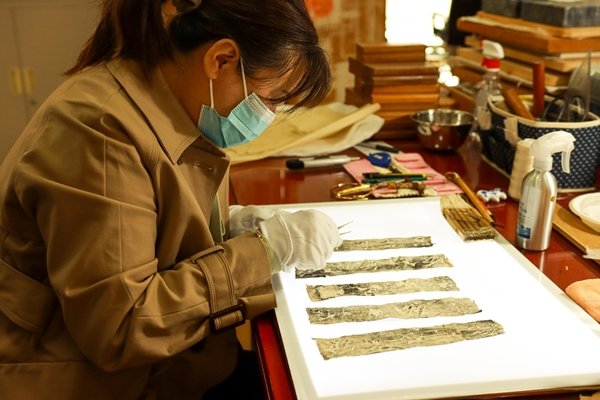 Repairer Breathes New Life into Damaged Ancient Books