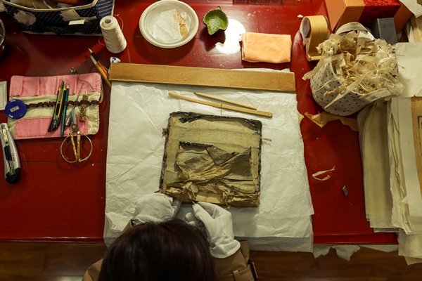 Repairer Breathes New Life into Damaged Ancient Books