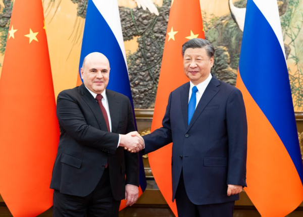Xi Meets Russian PM