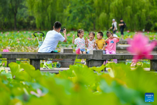 People Go out for Various Activities During Dragon Boat Festival Holiday Across China