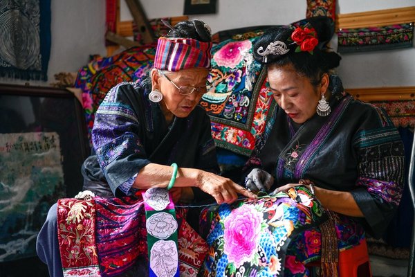 Miao Embroiderer Takes Ethnic Intangible Heritage to World Stage