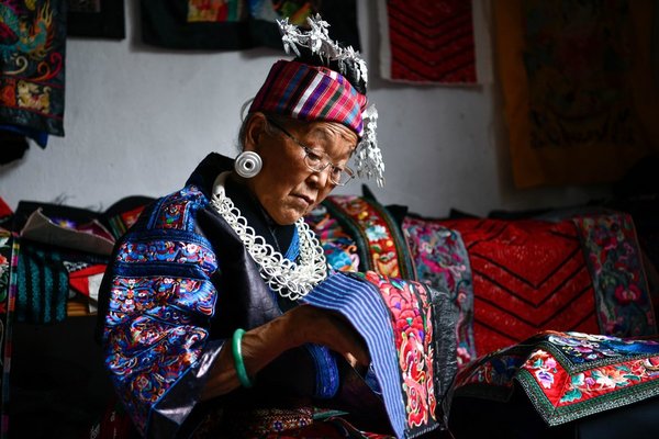 Miao Embroiderer Takes Ethnic Intangible Heritage to World Stage