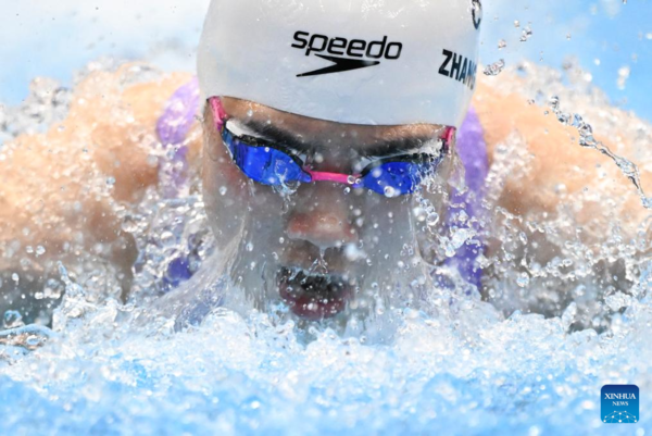 China Wins Two More Gold Medals, Qin Lands Second Breaststroke Title