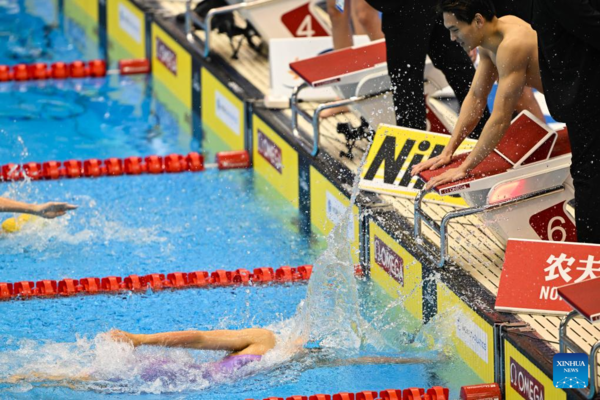 China Wins Two More Gold Medals, Qin Lands Second Breaststroke Title