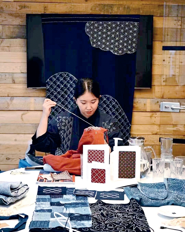 Young Woman Promotes Tie-Dyeing in UK