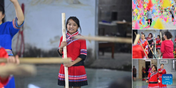 Students Learn About Intangible Cultural Heritages in Summer Vacation in Guangxi, S China