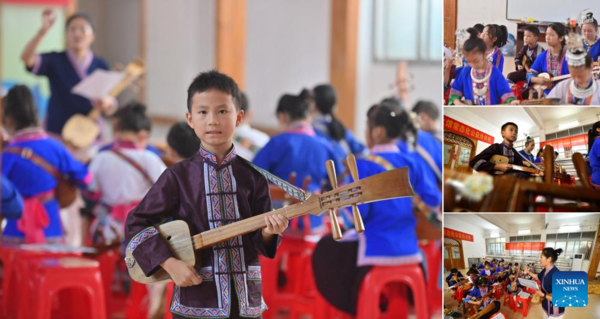 Students Learn About Intangible Cultural Heritages in Summer Vacation in Guangxi, S China