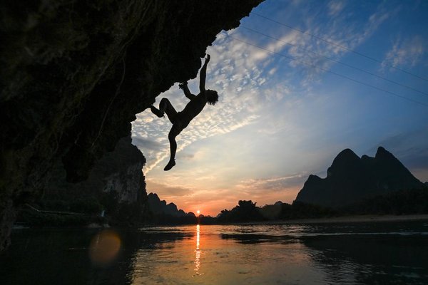 Sports Geography | China's Elite Rock Climbing Couple Promote the Sport Among Yangshuo Karst Mountains in Guilin