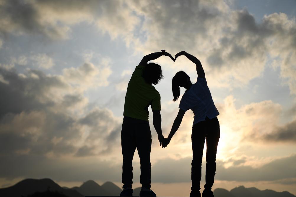 Sports Geography | China's Elite Rock Climbing Couple Promote the Sport Among Yangshuo Karst Mountains in Guilin