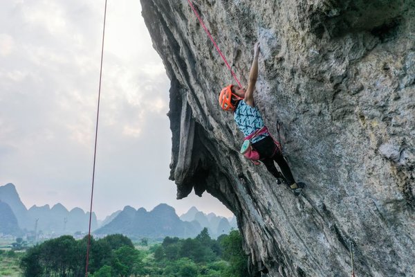 Sports Geography | China's Elite Rock Climbing Couple Promote the Sport Among Yangshuo Karst Mountains in Guilin