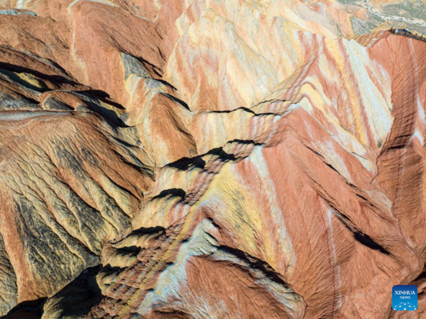 Danxia National Geological Park in NW China Attracts Tourists with Unique Landscape