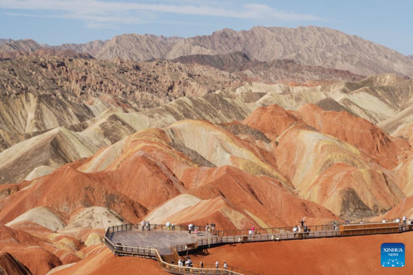 Danxia National Geological Park in NW China Attracts Tourists with Unique Landscape