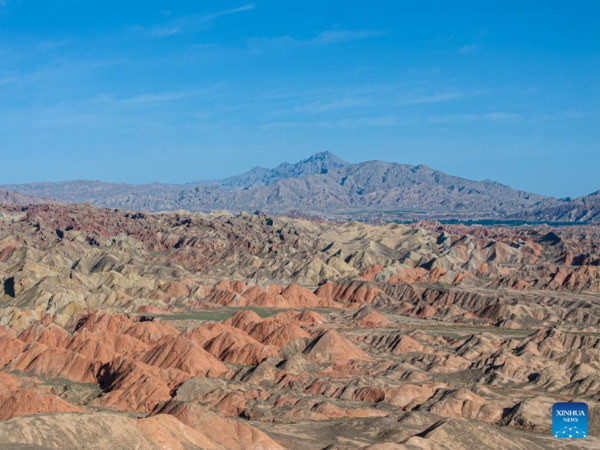 Danxia National Geological Park in NW China Attracts Tourists with Unique Landscape