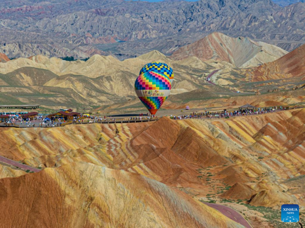 Danxia National Geological Park in NW China Attracts Tourists with Unique Landscape