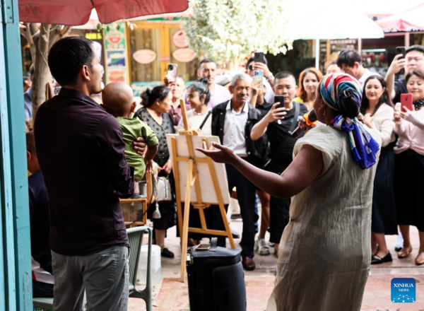 Transnational Couple Run Cafe in Xinjiang's Kashgar