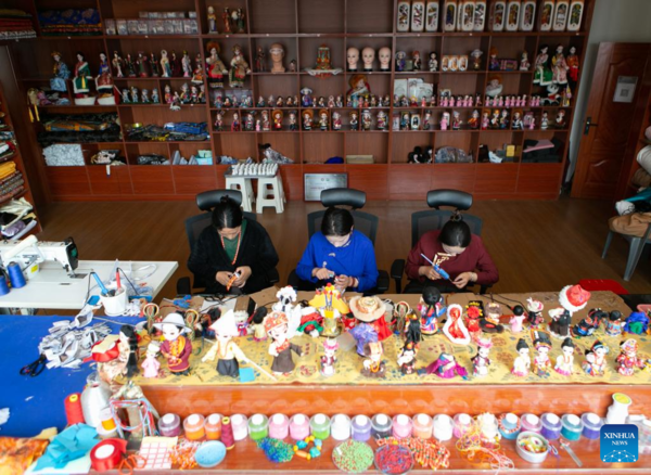 Handmade Dolls Bring Fortunes to Local Residents in SW China's County