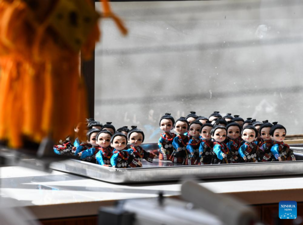 Handmade Dolls Bring Fortunes to Local Residents in SW China's County