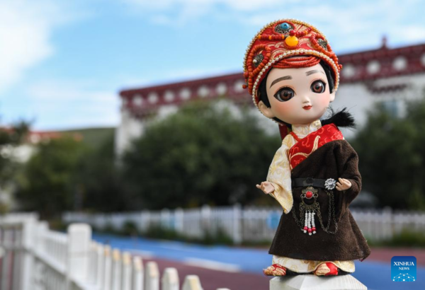 Handmade Dolls Bring Fortunes to Local Residents in SW China's County