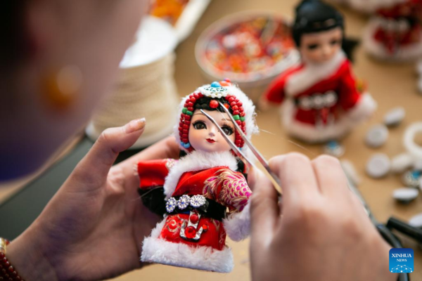 Handmade Dolls Bring Fortunes to Local Residents in SW China's County