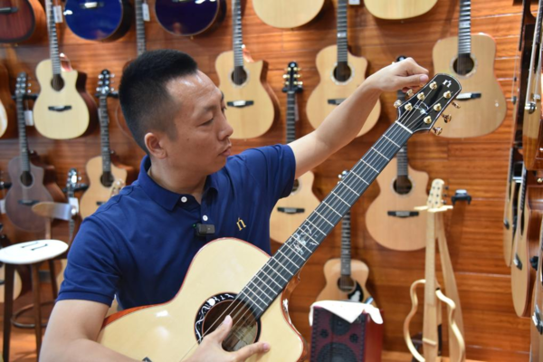 Chinese Guitar-Making Industry Rides on Wave of Belt and Road Initiative