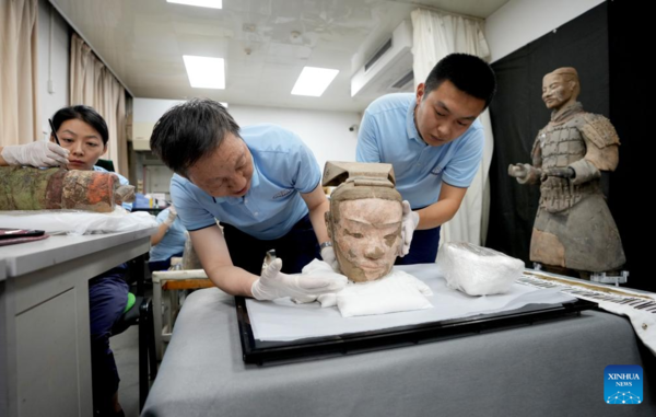 Experts Restore Terracotta Warriors in Xi'an