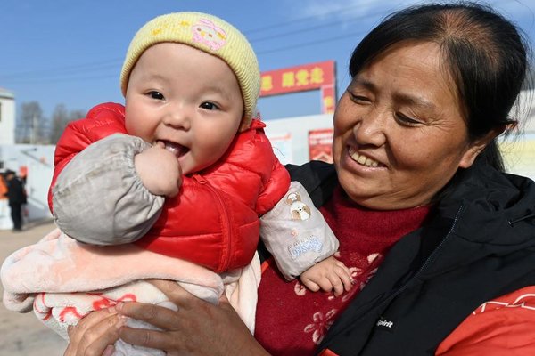 People Bustle on the First Day of 2024 in Relocation Sites of NW China's Gansu, Qinghai