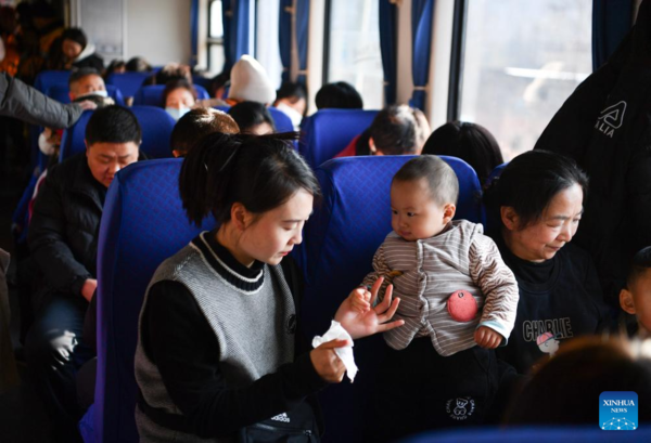 China's Slow Trains Ensure Smooth Trips During Spring Festival Travel Rush