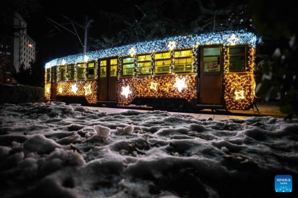 Trams Decorated with Lights to Attract Tourists in Dalian, China's Liaoning