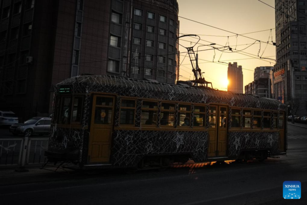 Trams Decorated with Lights to Attract Tourists in Dalian, China's Liaoning