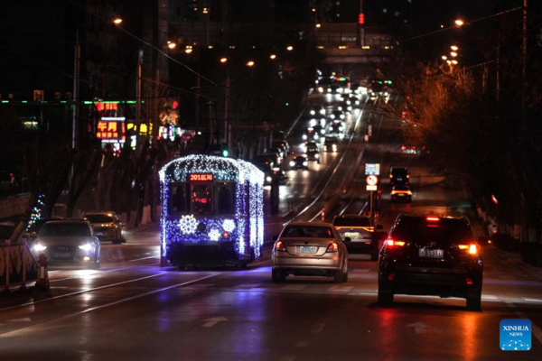 Trams Decorated with Lights to Attract Tourists in Dalian, China's Liaoning