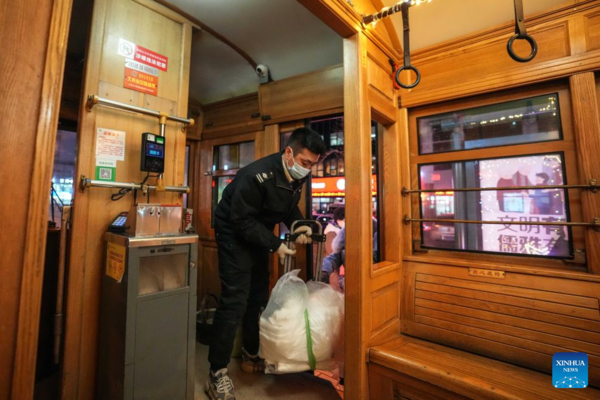 Trams Decorated with Lights to Attract Tourists in Dalian, China's Liaoning