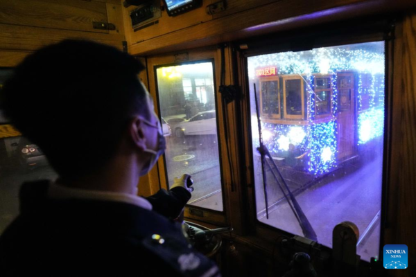 Trams Decorated with Lights to Attract Tourists in Dalian, China's Liaoning