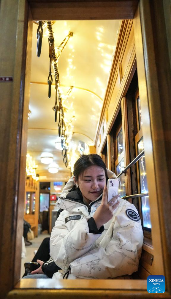 Trams Decorated with Lights to Attract Tourists in Dalian, China's Liaoning