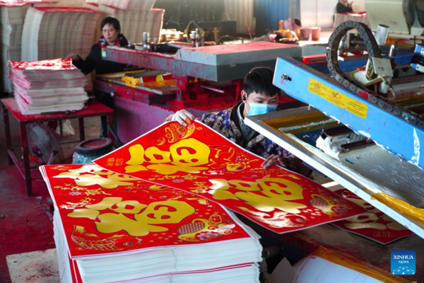 Workers Produce Spring Festival Posters in China's Shandong