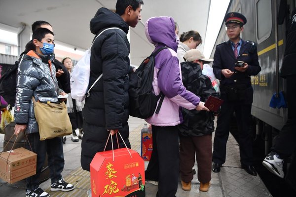 'Slow Trains' Facilitate People's Shopping for Upcoming Chinese Lunar New Year in NW China's Gansu