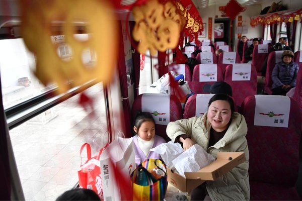 'Slow Trains' Facilitate People's Shopping for Upcoming Chinese Lunar New Year in NW China's Gansu