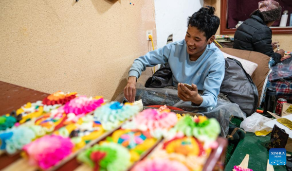 People Prepare Butter Sculptures Before Spring Festival in Lhasa, SW China