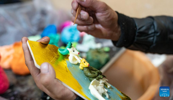 People Prepare Butter Sculptures Before Spring Festival in Lhasa, SW China