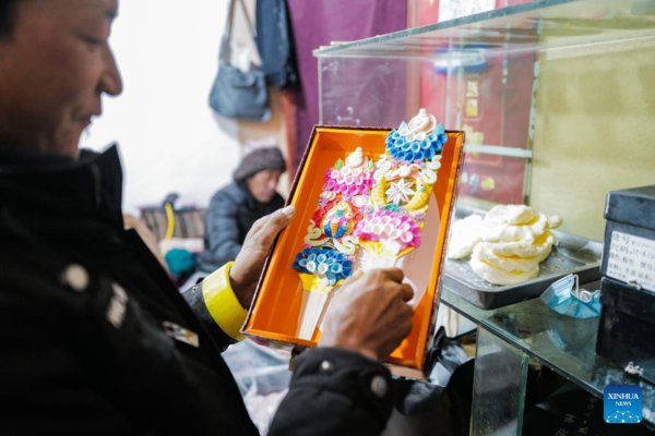 People Prepare Butter Sculptures Before Spring Festival in Lhasa, SW China