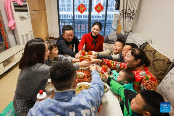 People Across China Have Family Reunion Dinners on Chinese Lunar New Year's Eve