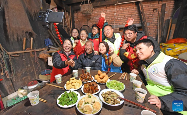 People Across China Have Family Reunion Dinners on Chinese Lunar New Year's Eve