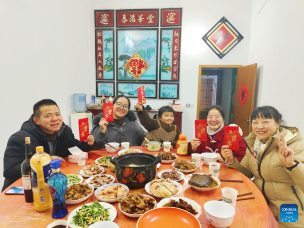 People Across China Have Family Reunion Dinners on Chinese Lunar New Year's Eve