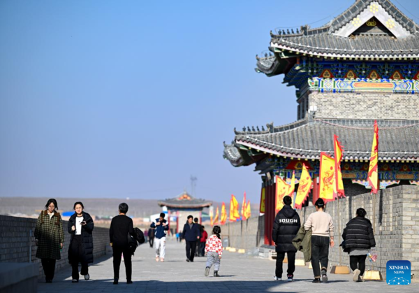 China Focus: Longer Spring Festival Holiday Sparks Travel Frenzy Among Chinese