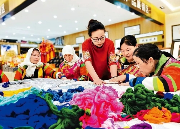 Helping Women Villagers Embroider Better Lives