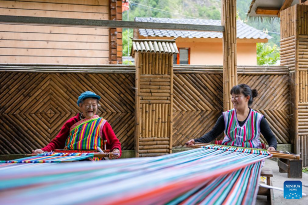 Remote Ethnic Villagers Find New Horizons in Infrastructure Development Remote Ethnic Villagers Find New Horizons in Infrastructure Development