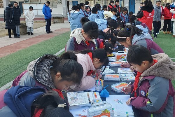 Women's Federations, College Students Care for Rural Children in Anhui